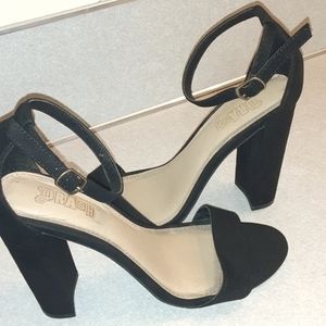 Size 6 black high heels.